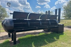racks inside of large bbq pit