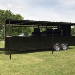 bbq pit on enclosed trailer with awning