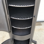racks inside of vertical smoker
