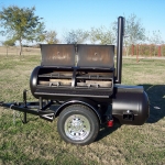 racks inside of patio smoker on trailer