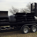 racks inside of bbq pit/smoker/grill on trailer