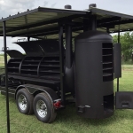 racks inside of bbq pit on trailer