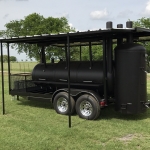 bbq pit on trailer with awning