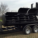 racks inside of bbq pit/smoker/grill on trailer