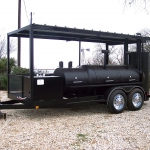 large smoker on trailer with roof