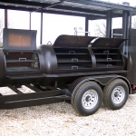 large smoker on trailer with roof