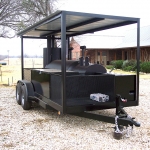 large smoker on trailer with roof