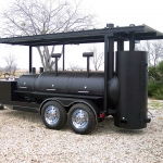 large smoker on trailer with roof