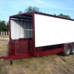 large bbq pit on trailer with roof and awning