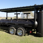 large dual grill on trailer with roof