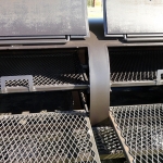 racks inside of large dual grill on trailer with roof