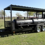 large dual grill on trailer with roof