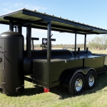 large dual grill on trailer with roof