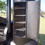 racks inside of meduim bbq pit on trailer