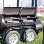 medium smoker on trailer with roof