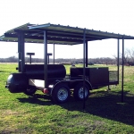 medium smoker on trailer with roof