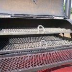 racks inside of small patio smoker