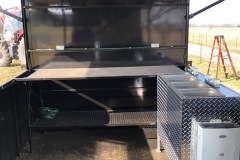 inside of enclosed trailer with awning
