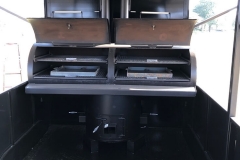 racks inside of  t pit on enclosed trailer